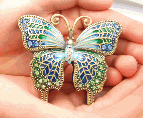 Blue Butterfly Cremation Keepsake shown in hands